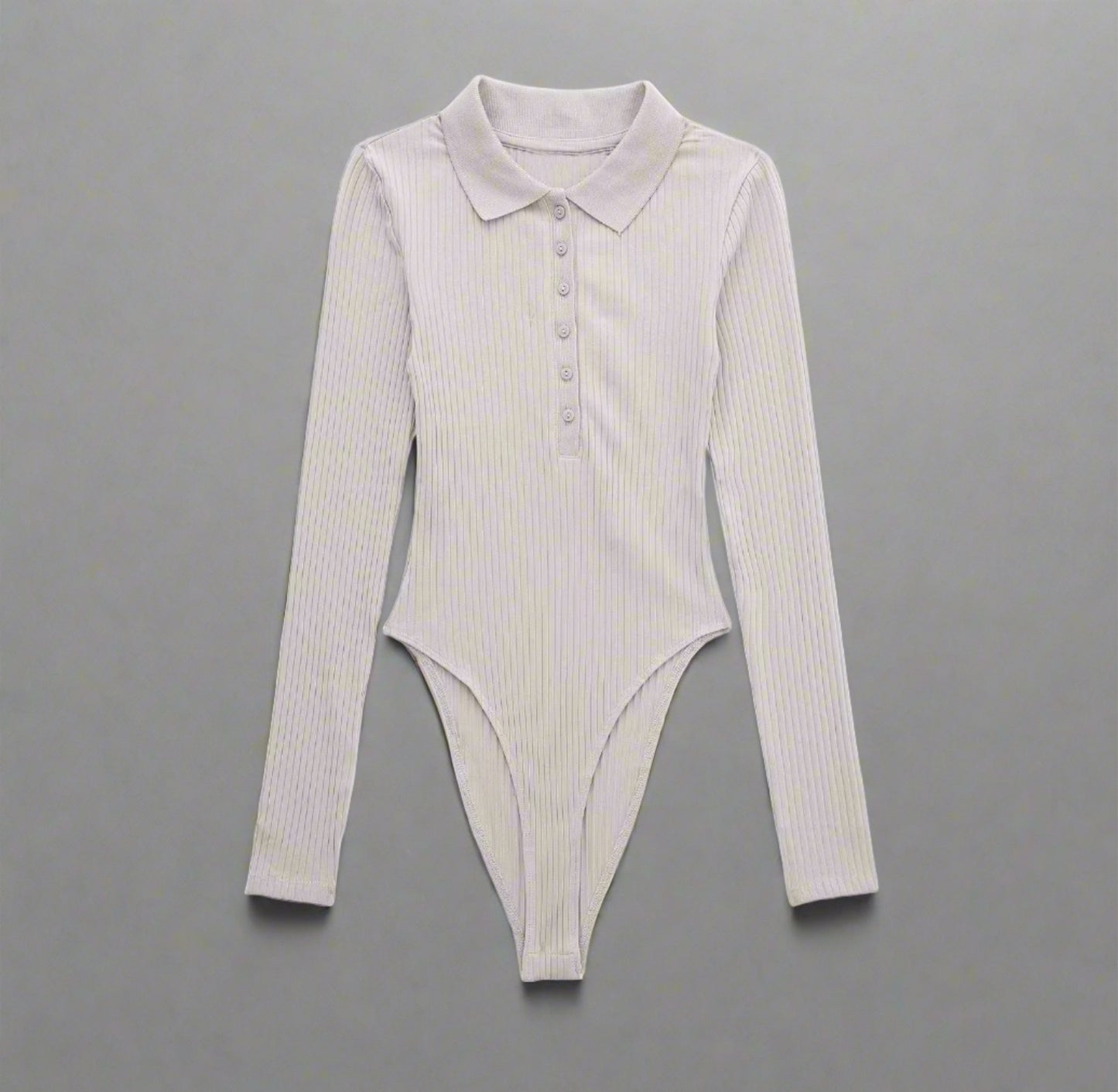 Classic Ribbed Long Sleeve Bodysuit - available in white, light gray, and brown, collared neckline, long sleeves, button-up front, ribbed fabric, fitted design, perfect for layering or wearing on its own.