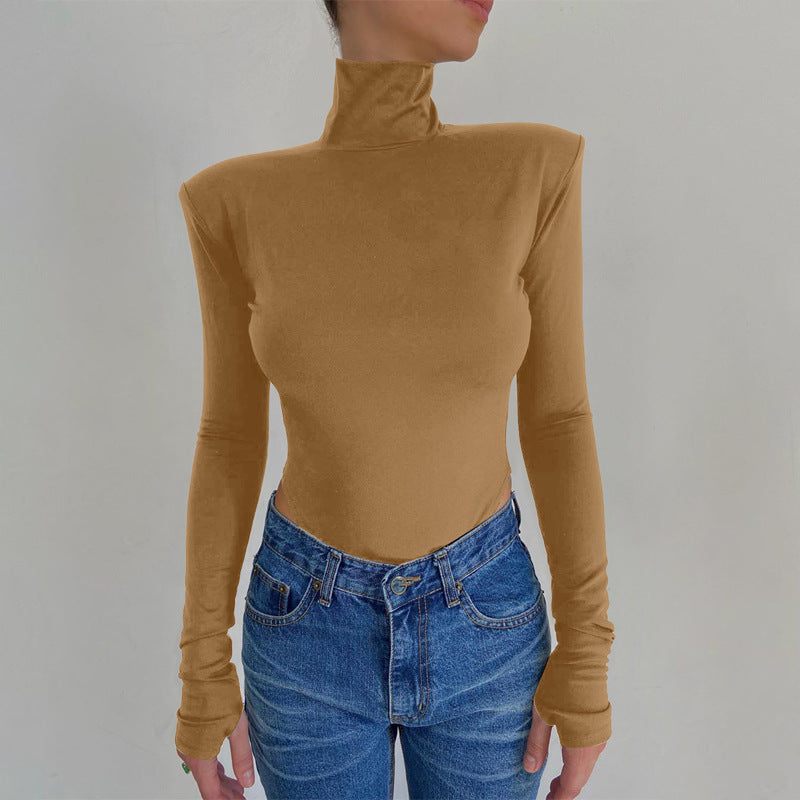 Model wearing the Bold Allure Open-Back Long Sleeve Bodysuit in camel, ideal for stylish travel outfits