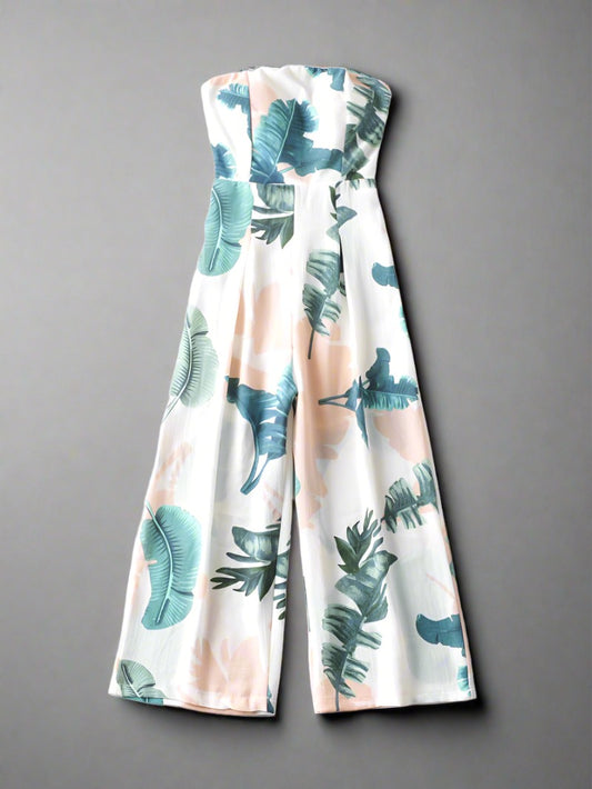 Tropical Breeze Strapless Jumpsuit with vibrant leaf print, perfect for travelers.