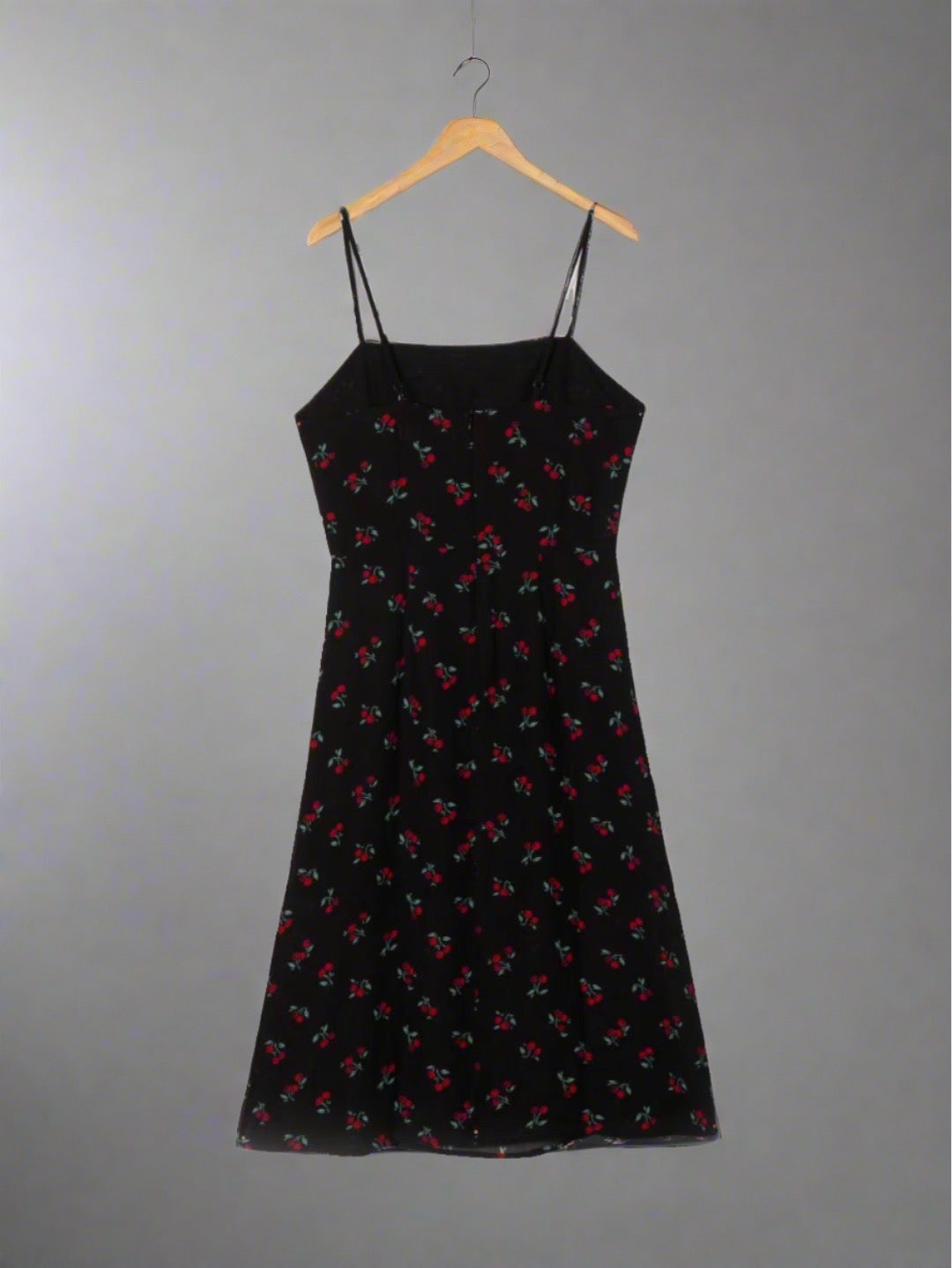 Cherry Print Midi Dress - features fitted bodice, adjustable spaghetti straps, midi-length skirt, charming cherry print, high-quality fabric, suitable for casual and formal occasions.