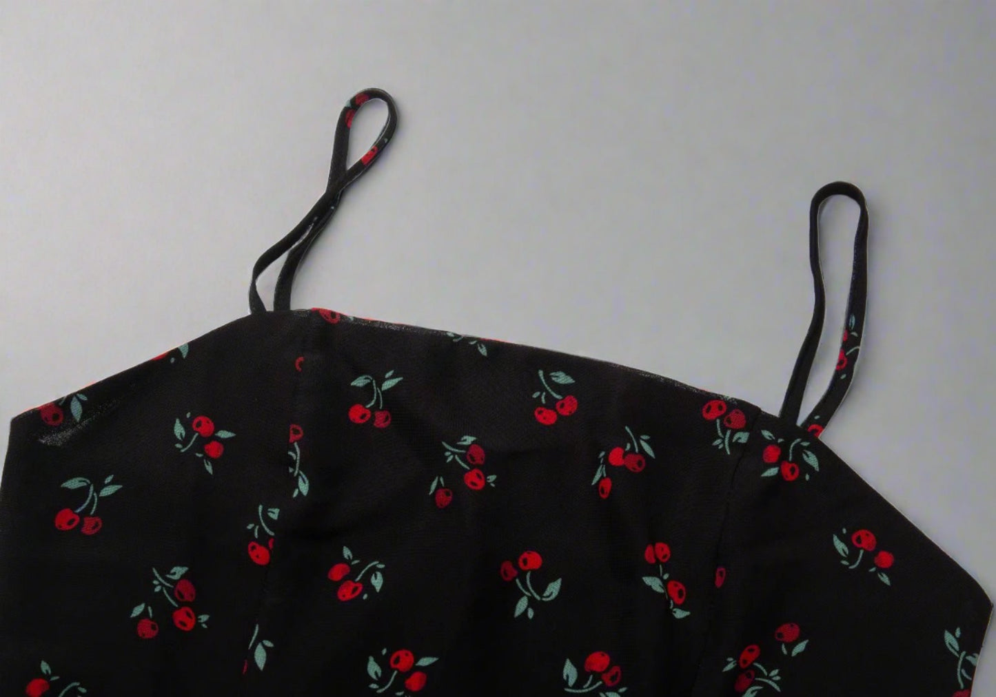 Cherry Print Midi Dress - features fitted bodice, adjustable spaghetti straps, midi-length skirt, charming cherry print, high-quality fabric, suitable for casual and formal occasions.