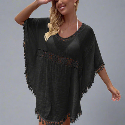 Crochet Trim Cover UpWoman wearing a boho crochet tassel cover-up in black