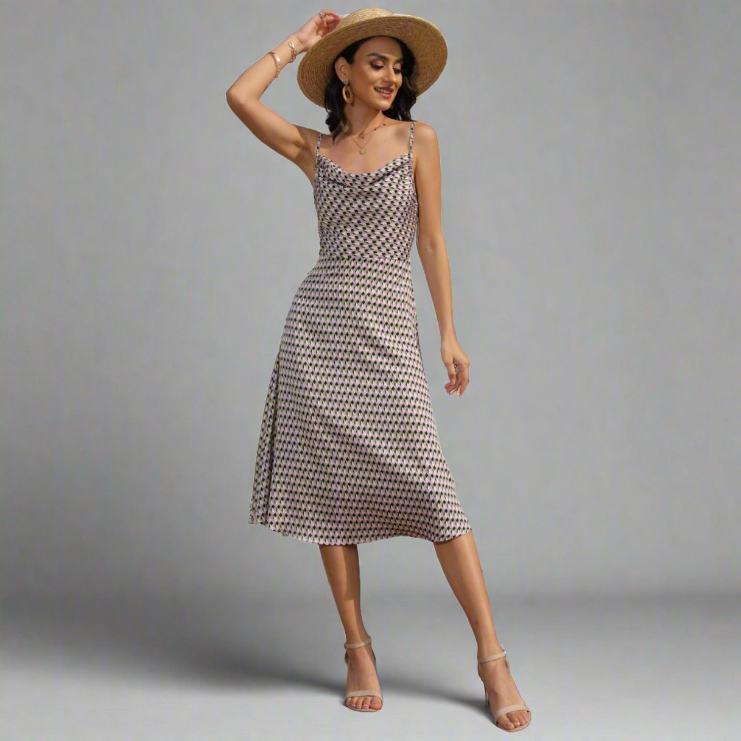 women standing wear Anchor Hanger's Cowl Neck Midi SundressWoman wearing a Geometric Pattern Midi Dress with adjustable spaghetti straps.