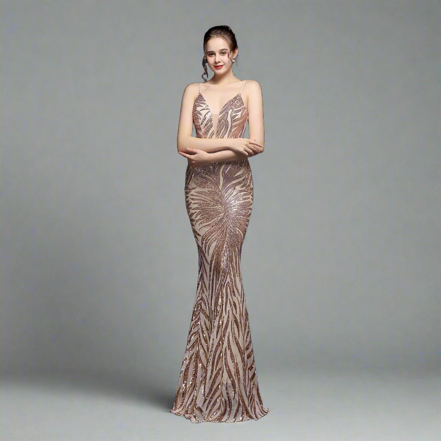 Model wearing Luxury Traveler's Sequin Gala Gown in gold, featuring a body-hugging silhouette with intricate sequin details and spaghetti straps