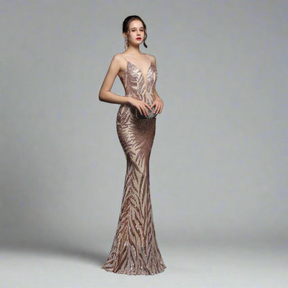 Model wearing Luxury Traveler's Sequin Gala Gown in gold, featuring a body-hugging silhouette with intricate sequin details and spaghetti straps